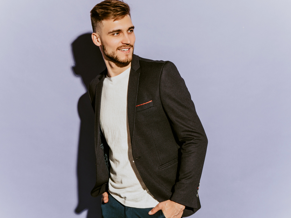 portrait-of-handsome-smiling-hipster-businessman-model-wearing-casual-black-suit.jpg